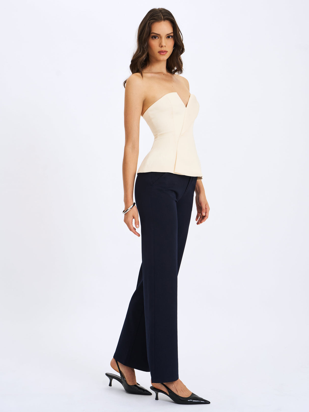 Yani Ivory Asymmetrical Lapel Sleeveless Peplum Top