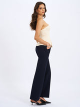 Yani Ivory Asymmetrical Lapel Sleeveless Peplum Top